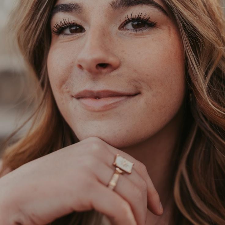 Kaveri Mehta, Lead Design Curator at Spark Studio Hub, reviewing corporate floral arrangements